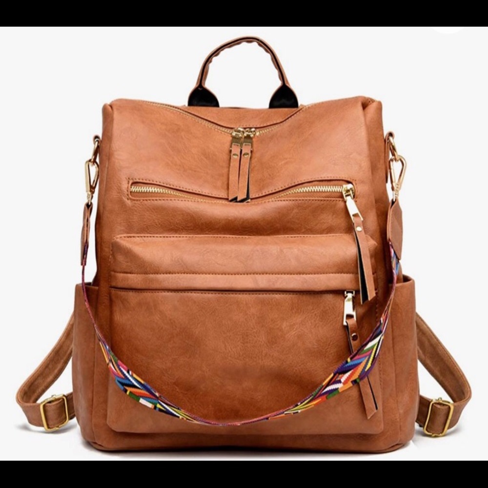 Cute backpack or shoulder bag! Like new, just was too small for my work junk!